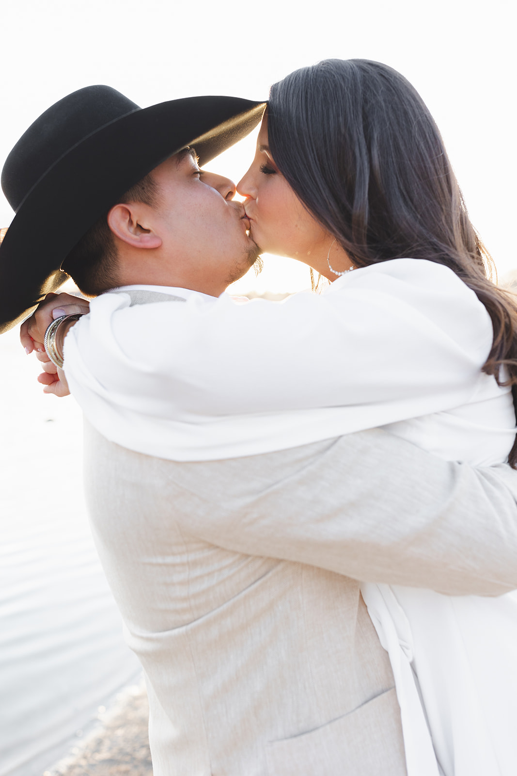 a couple kissing at their engagement session