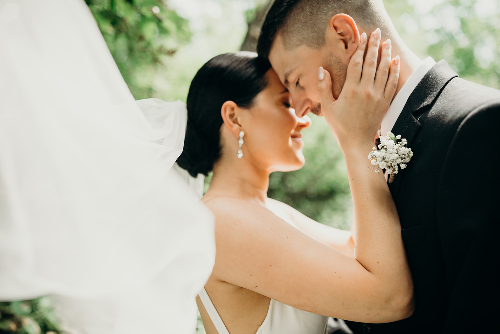 Couple embraces after their first-look on their wedding day