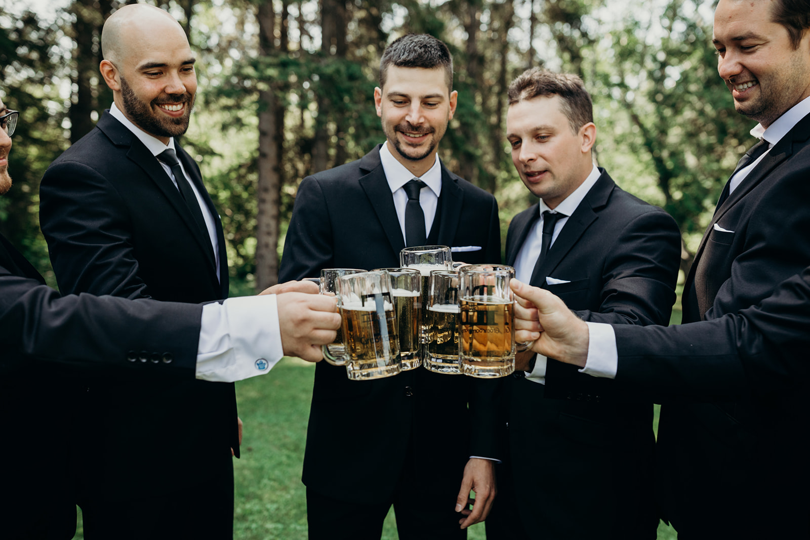 Groomsmen cheers on their wedding day before the wedding reception
