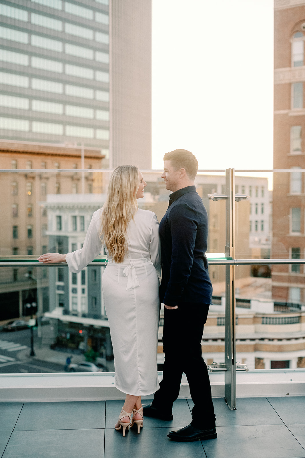 Rooftop Bar Engagement Session in Oakland California during sunset golden hour. High End Luxury Wedding Photographer. 