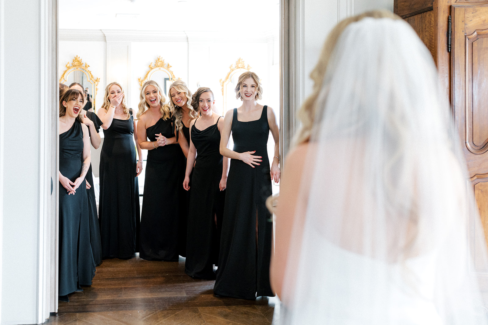 First look with bridesmaids at Park Chateau wedding