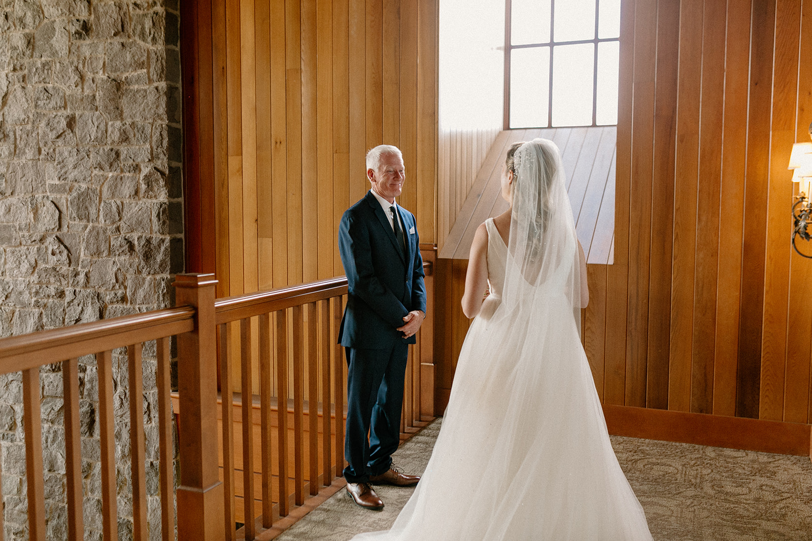 A bride has an emotional first look with her dad at her Oregon Golf Club wedding. 