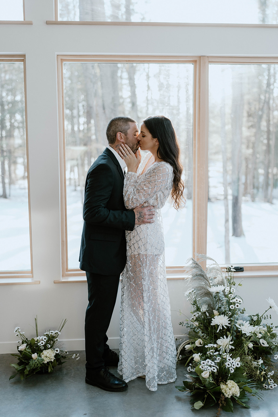 Bride and Groom kissing at their intimate ceremony