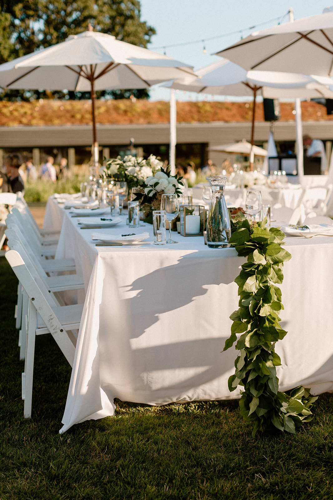 A wedding reception table set up at Sokol Blosser Winery. 