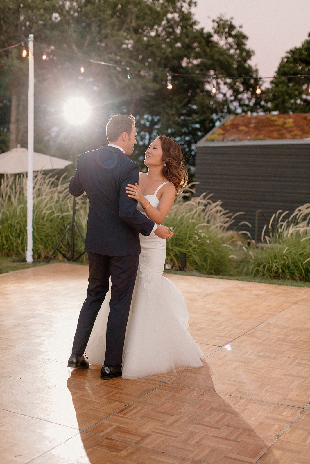 A bride and groom's first dance at their Sokal Blosser winery wedding. 