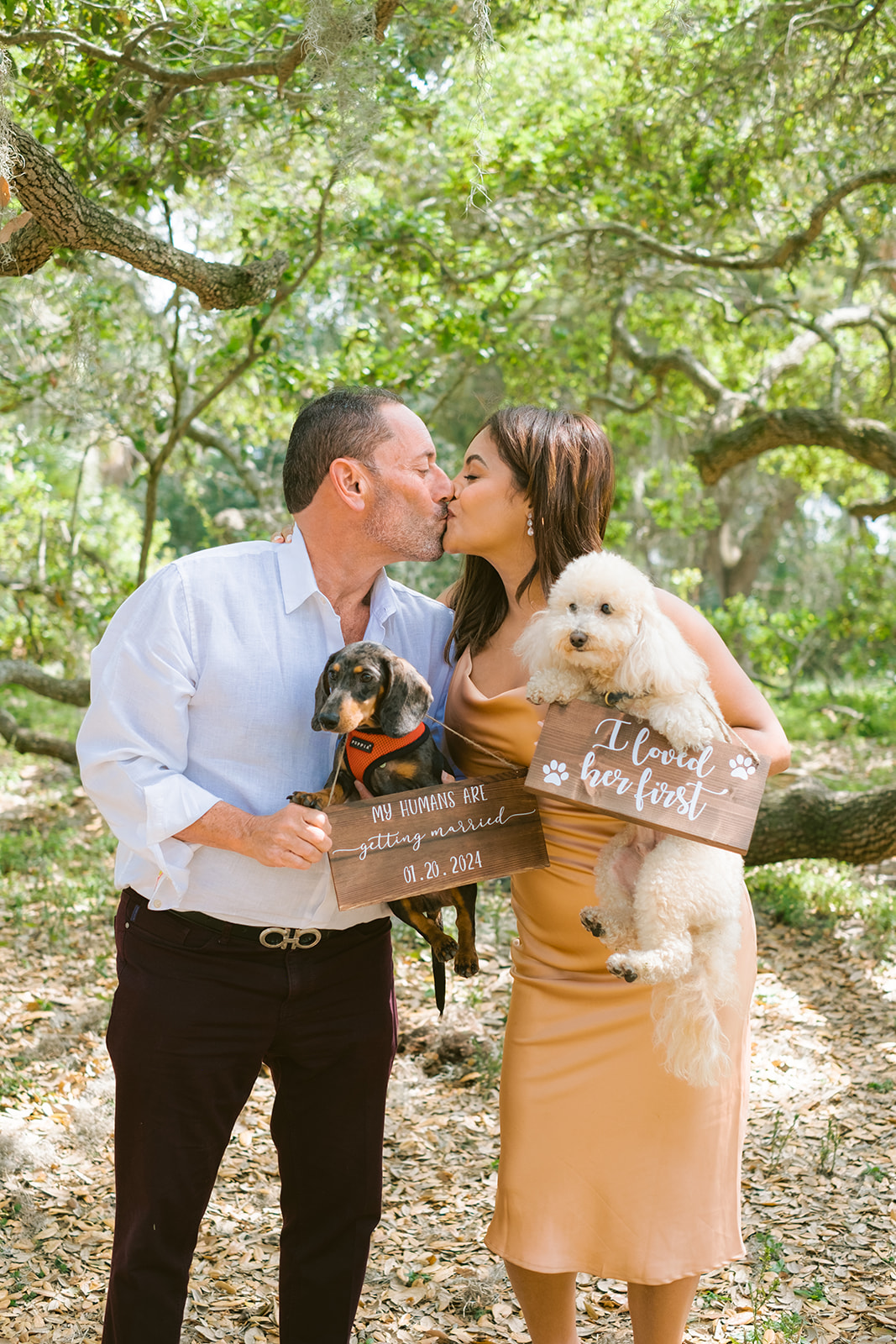 Couple's furry friends steal the show in their engagement photos at Philippe Park
