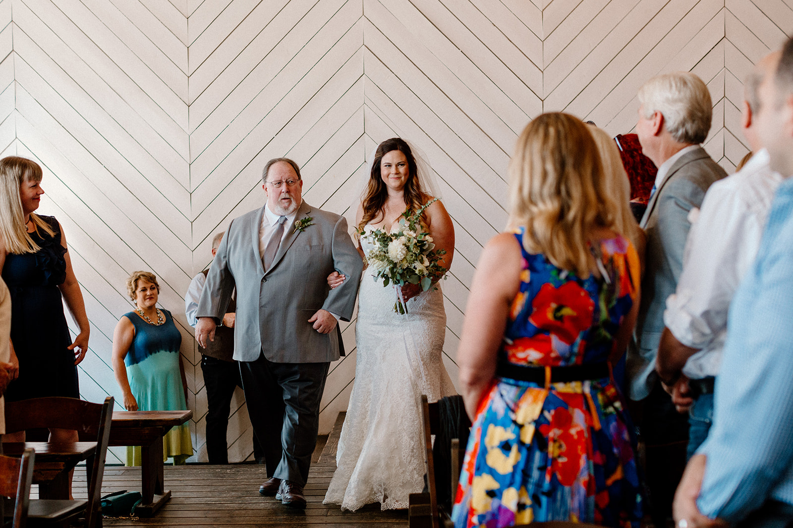 A father walking his daughter down the aisle at a Union Pine wedding. 