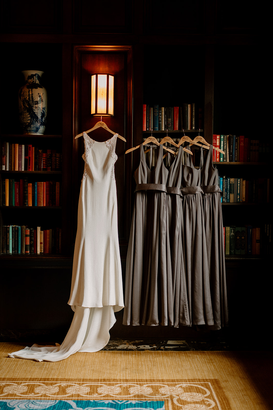 A wedding dress hanging in the Library room at the Sentinel Hotel in Portland, OR. 