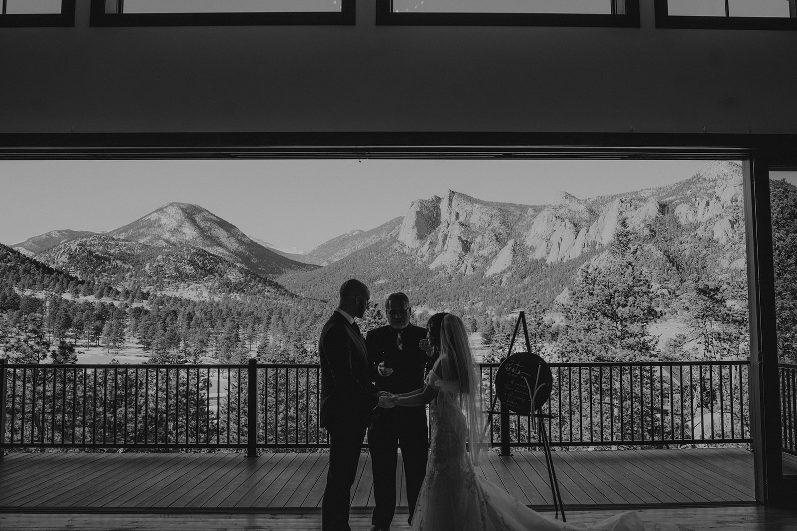 Ceremony at winter mountain wedding at Black Canyon Inn in Estes Park, Colorado