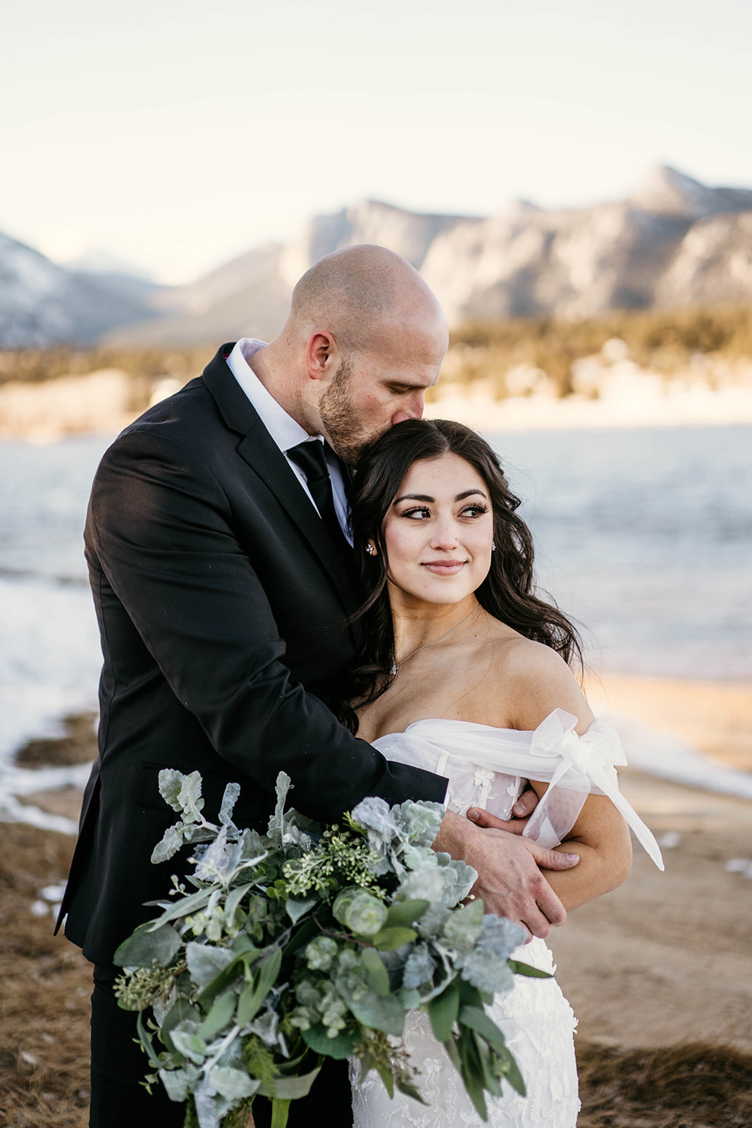 Intimate couples photos at winter mountain wedding at Black Canyon Inn in Estes Park, Colorado