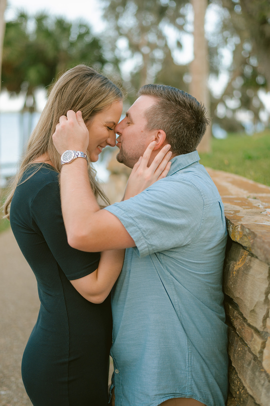 "Engagement photo with a rustic feel at Philippe Park, Tampa Florida"
