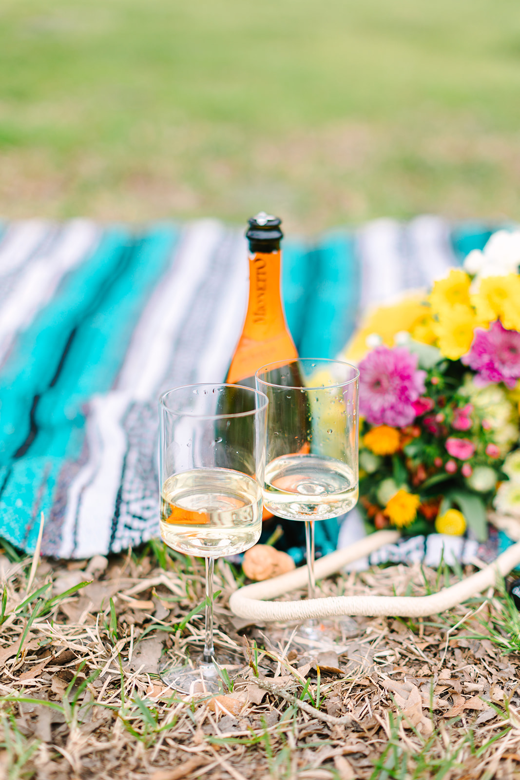 champagne and flowers picnic