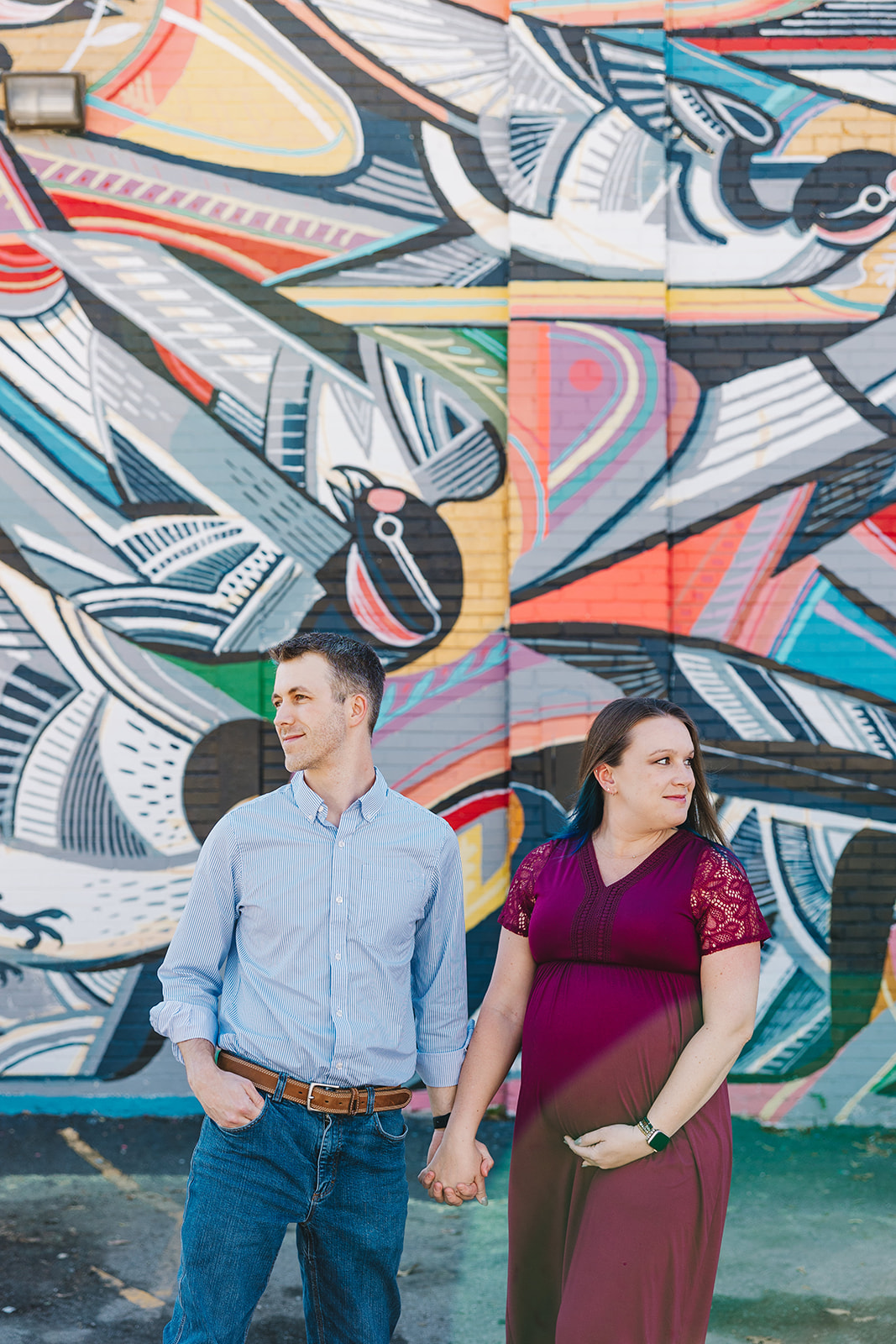a spring maternity session in front of David Hale's bird mural in downtown Athens, GA 