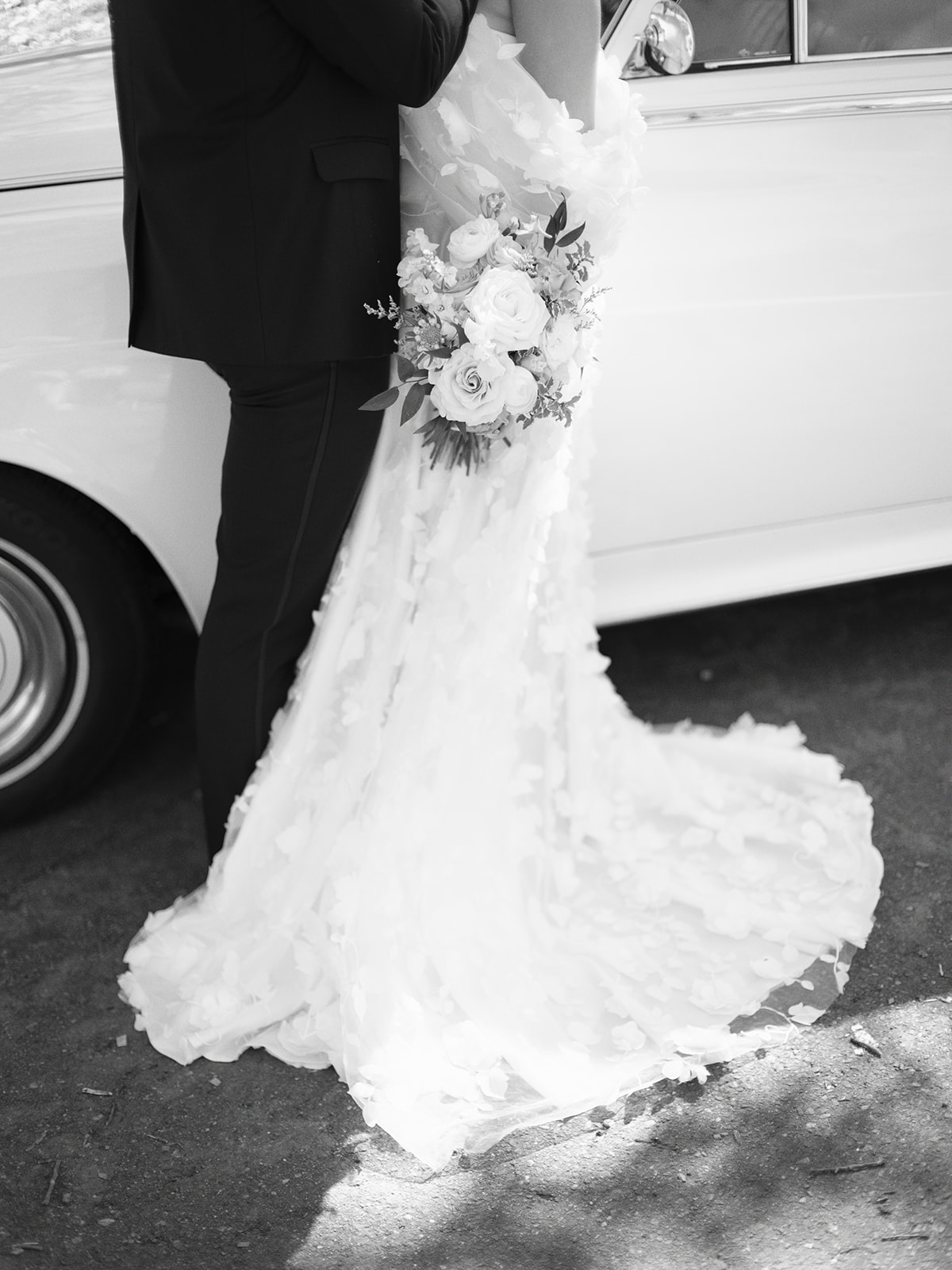 Clair de Lune wedding dress in front of classic Rolls-royce car