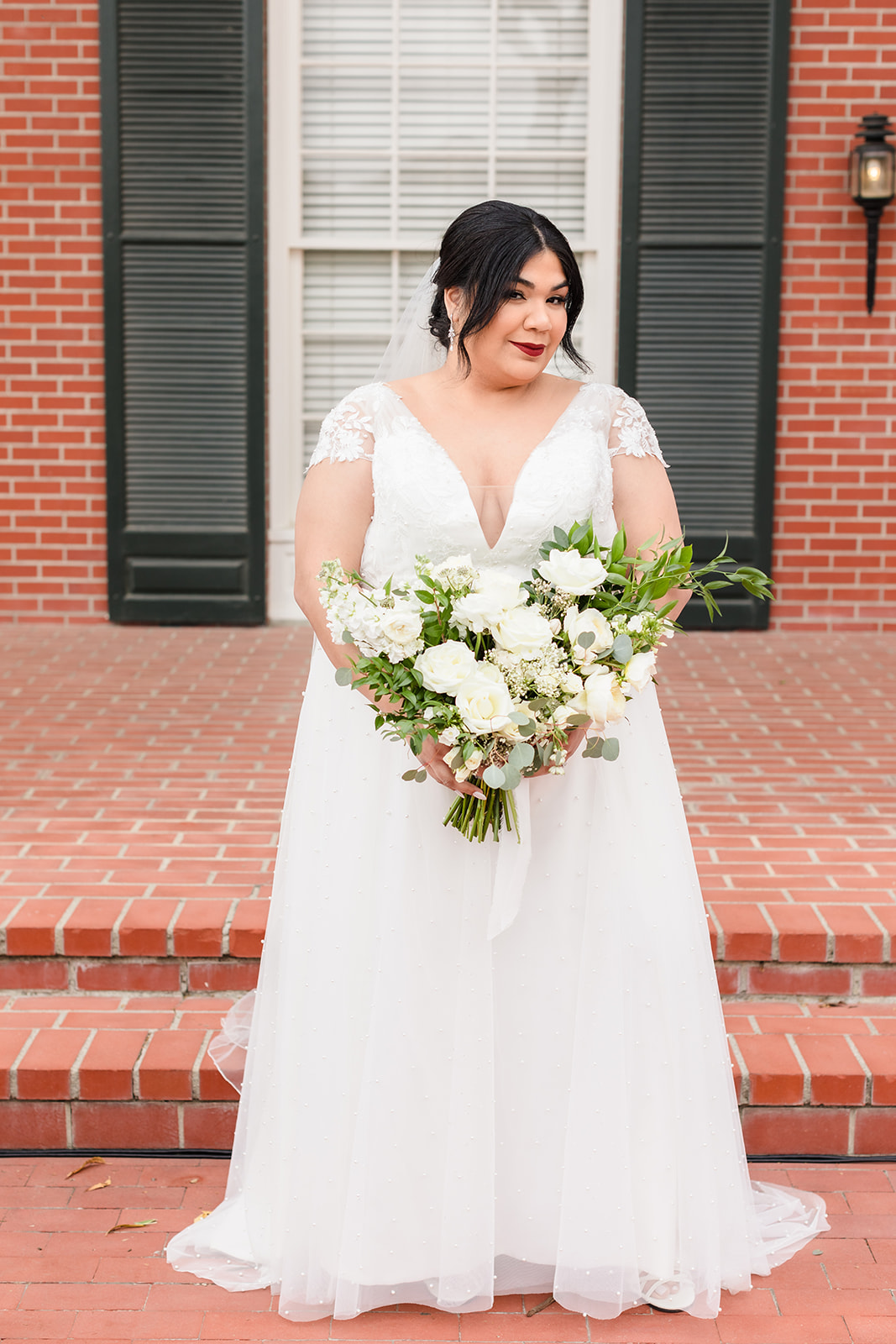 Bridal portrait on the front steps of Crestmore Manor in Jurupa Valley