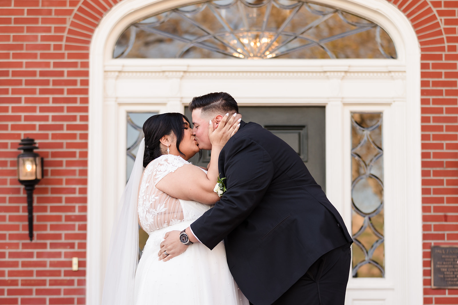 Bride and groom share first kiss at the end of their wedding ceremony
