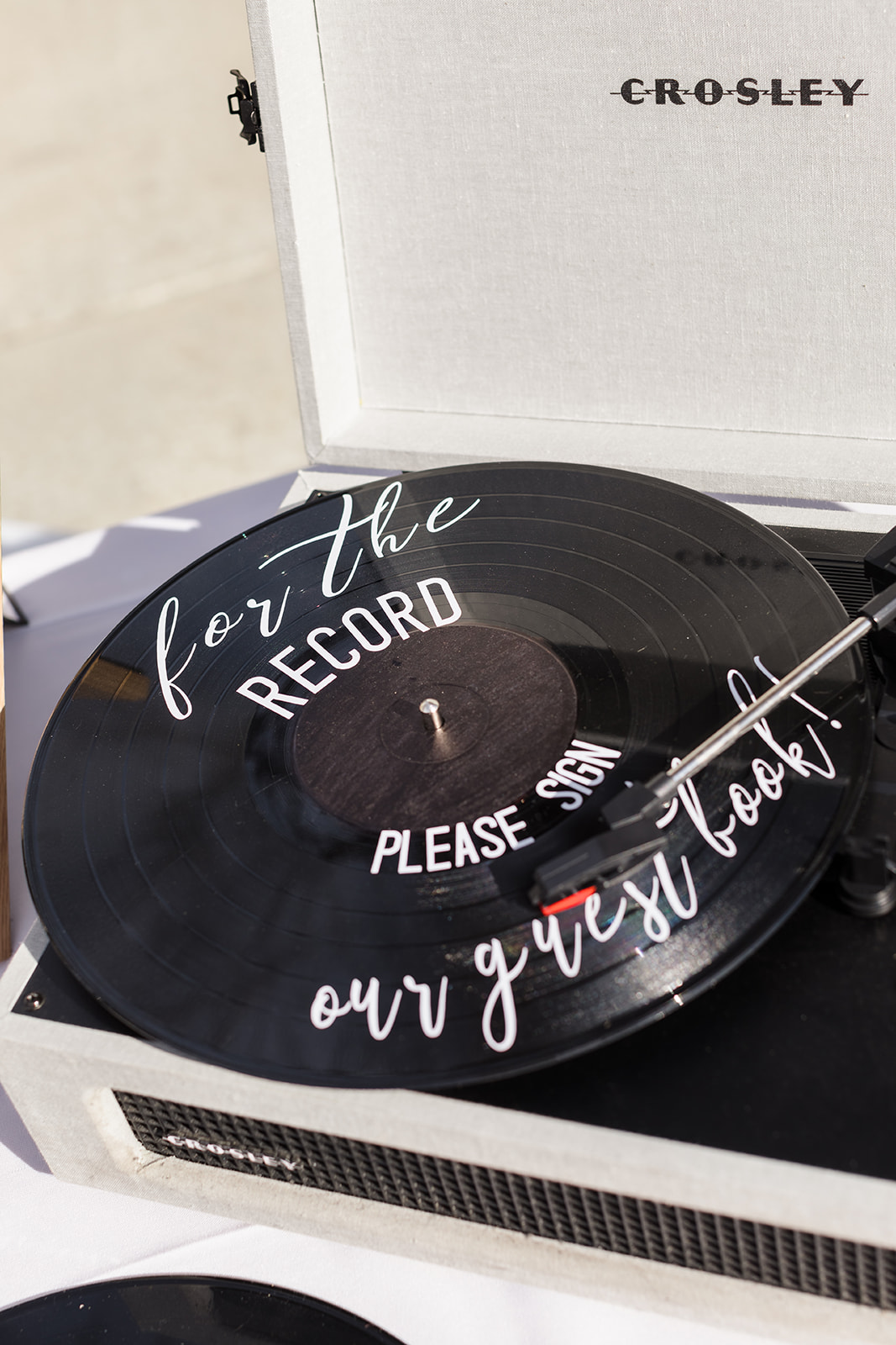 "For the record, sign our guestbook" Record wedding guest book alternative