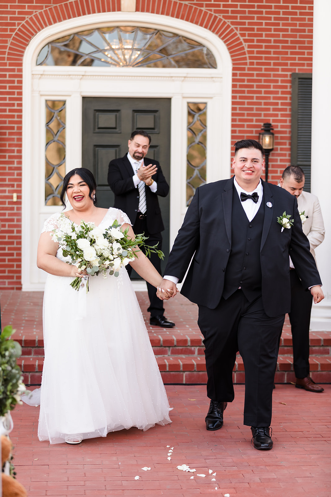 Newlywed recessional after wedding ceremony