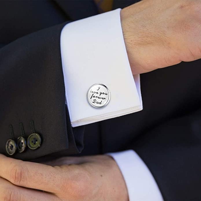 A custom engraved silver cuff link with a special message written to your dad on your wedding day.