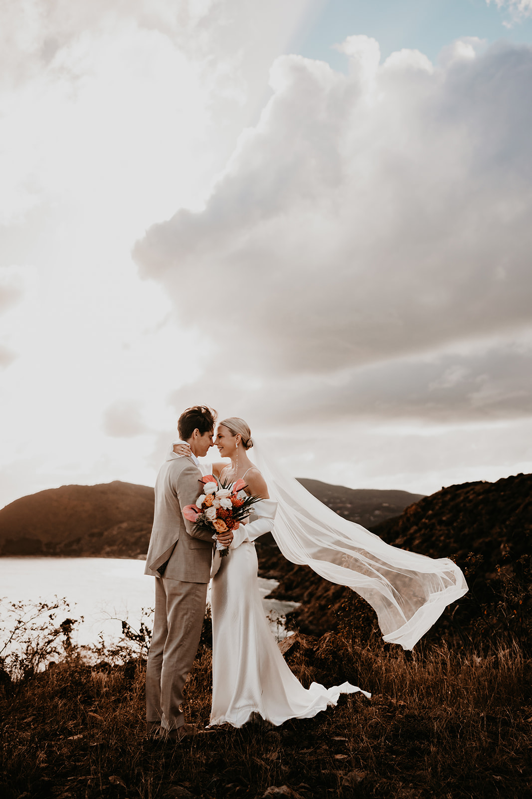 Breathtaking sunset wedding portrait with the British Virgin Islands as the backdrop