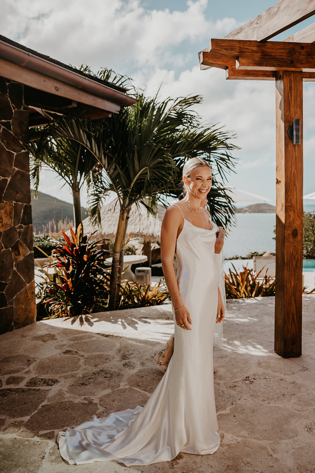 Experience a luxurious Caribbean destination wedding in the British Virgin Islands, surrounded by turquoise waters, whit