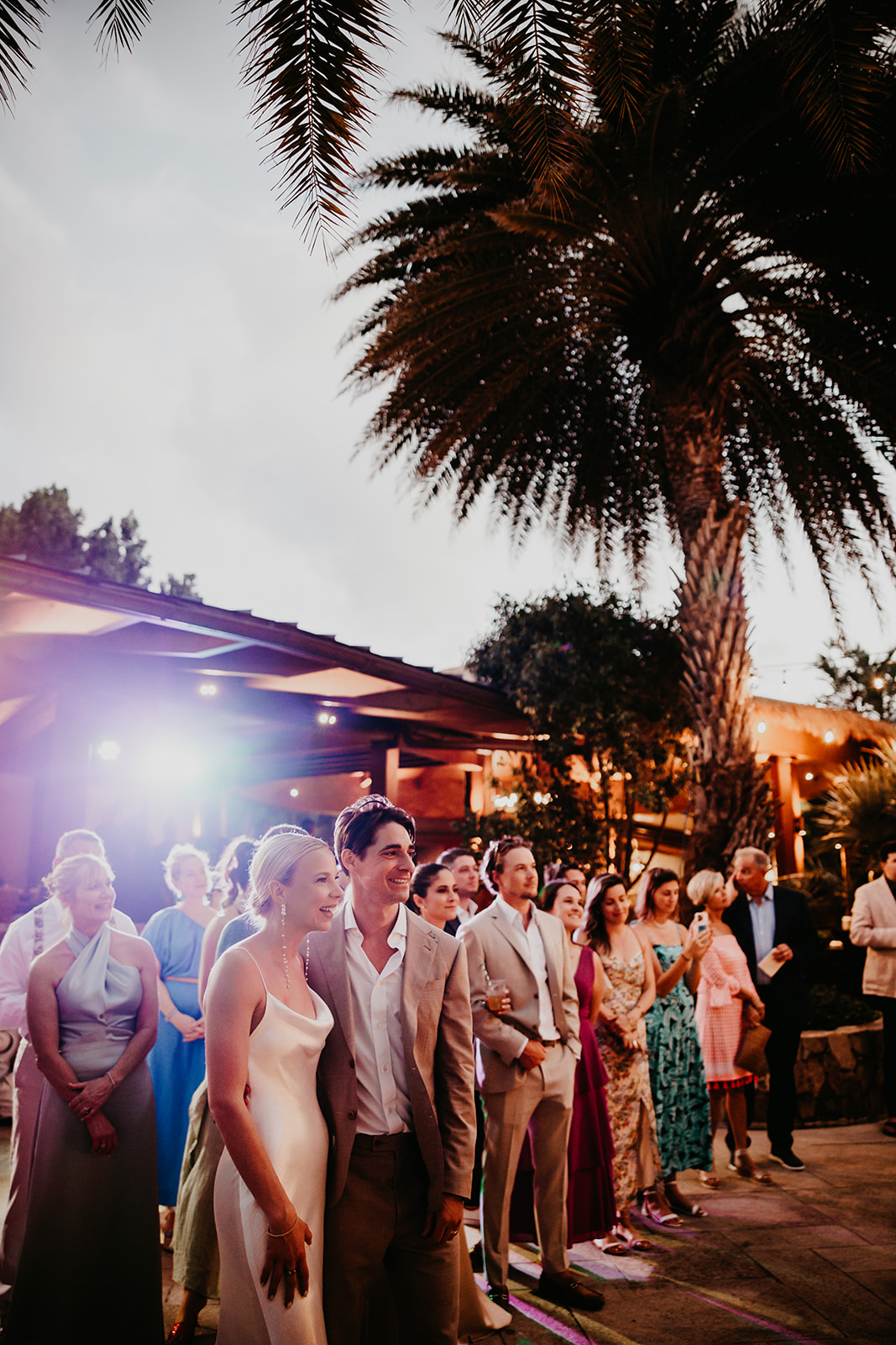 Magical evening wedding reception with twinkling lights and palm trees in the British Virgin Islands.