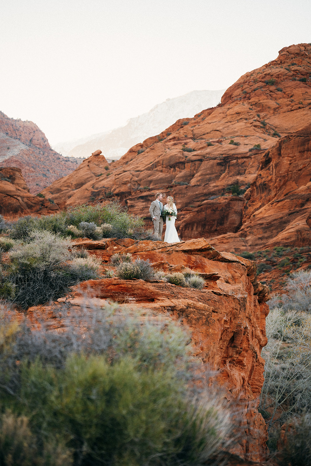 wedding couple on top of a cliff near Zion