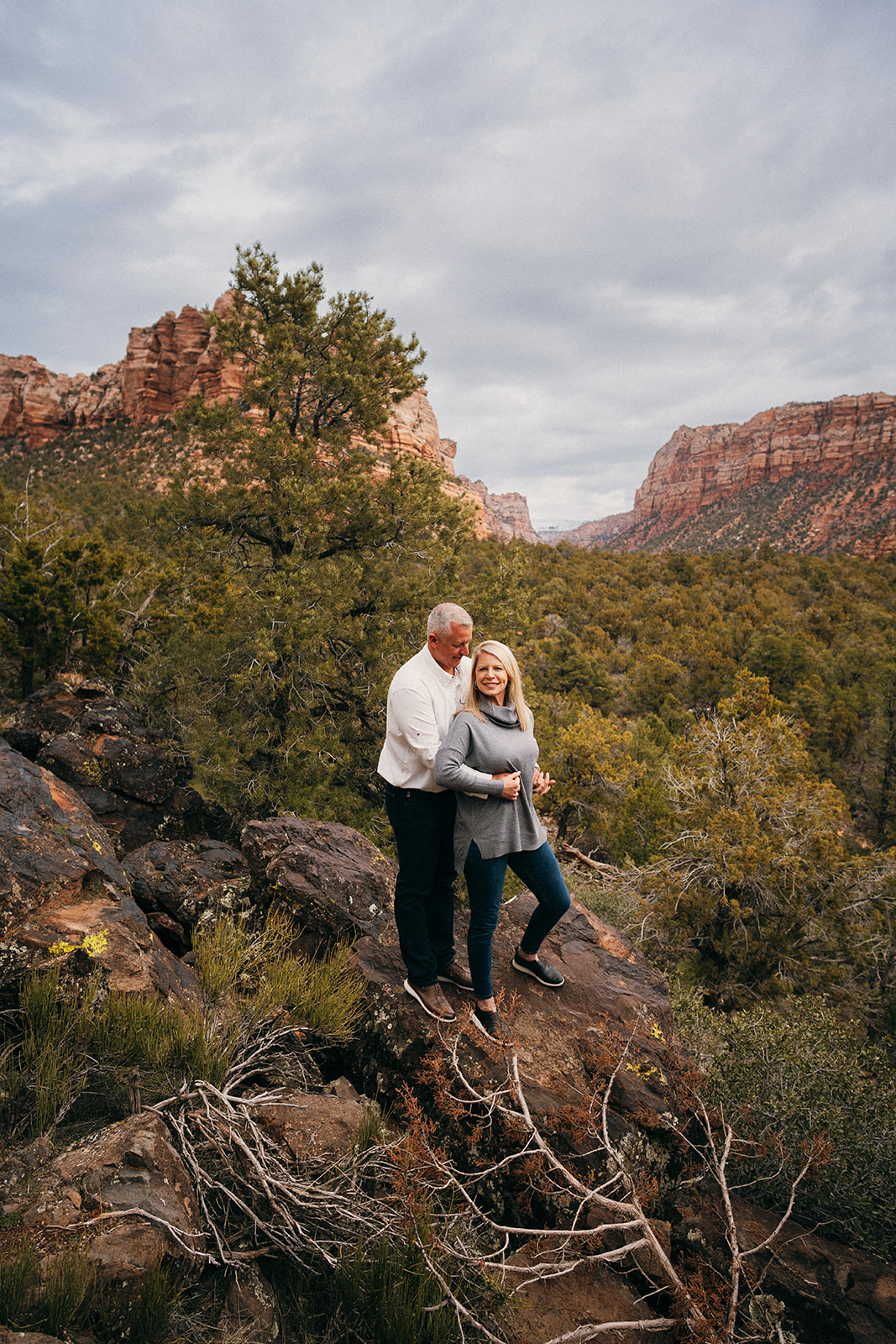 Proposing in Zion National Park amongst the red rock cliffs of Southern Utah. 