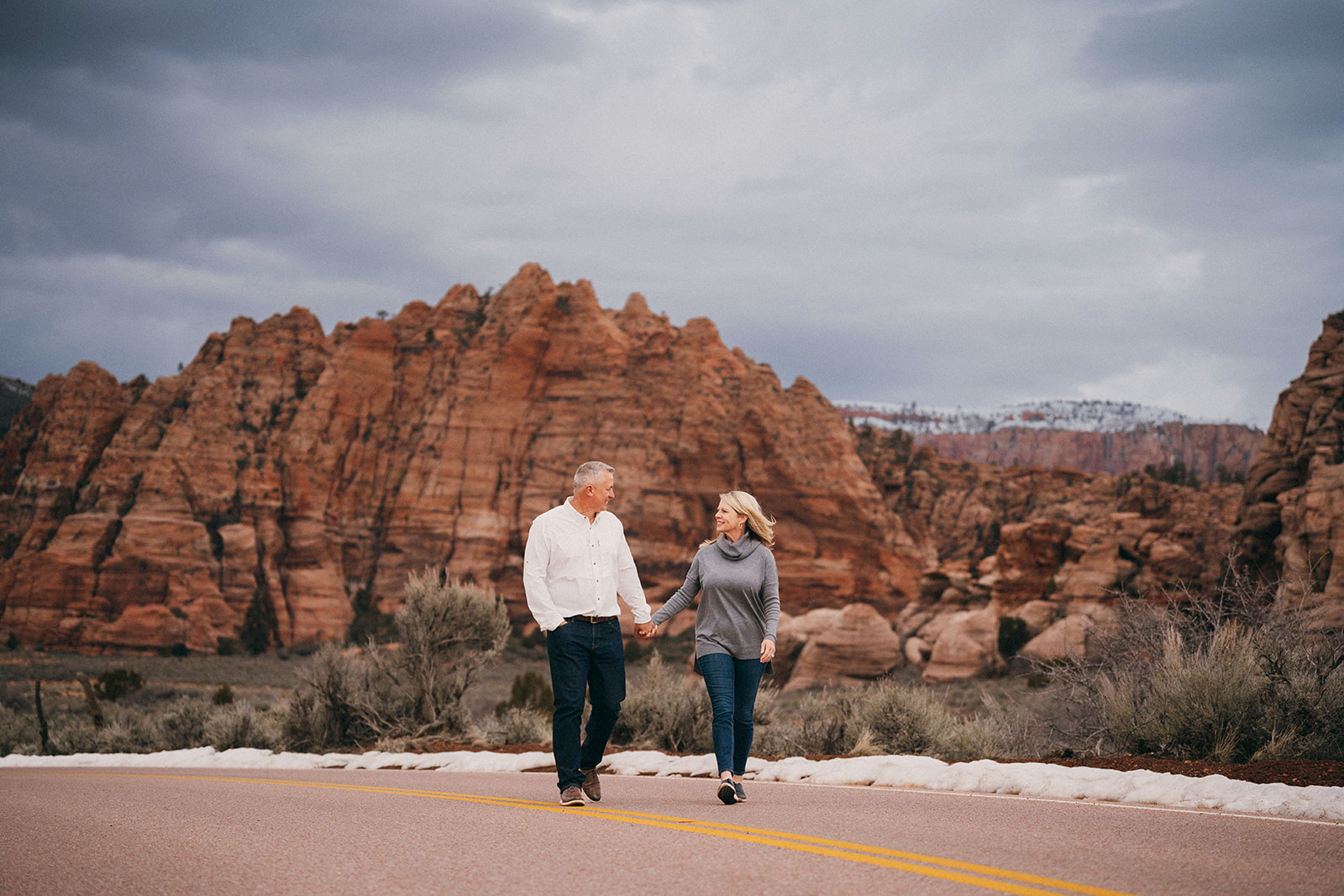 Proposing in Zion National Park amongst the red rock cliffs of Southern Utah in the winter. 