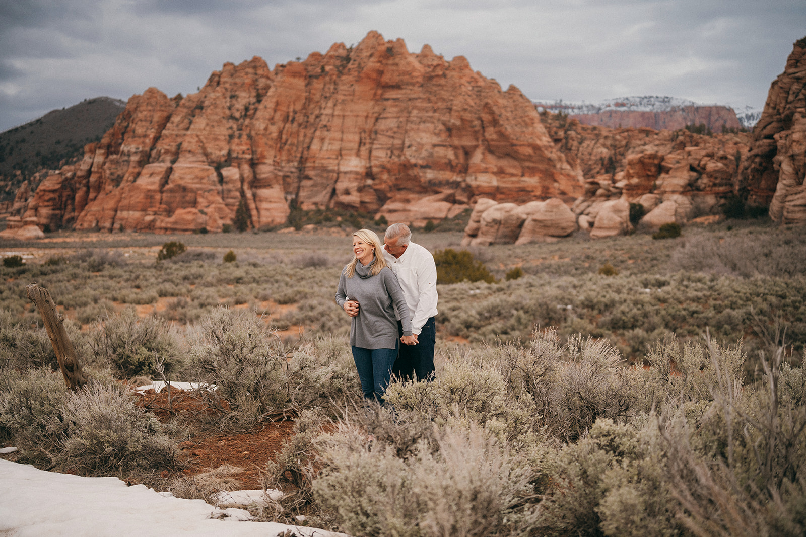 Proposing in Zion National Park amongst the red rock cliffs of Southern Utah in the winter. 
