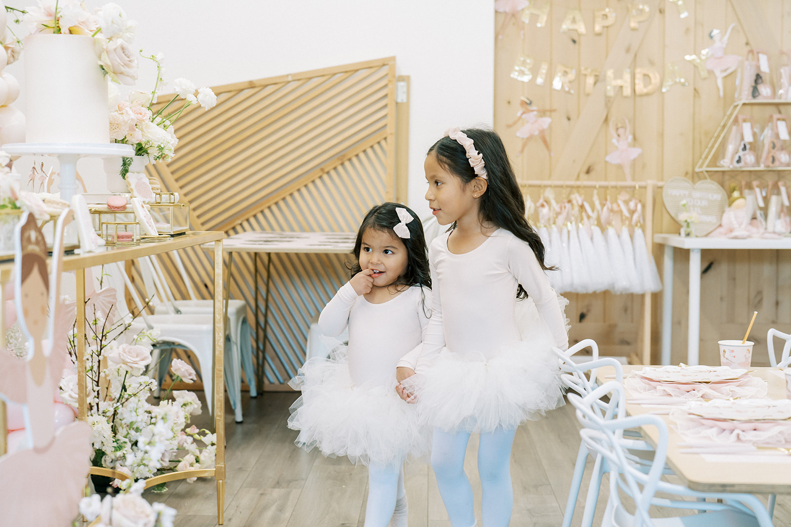 Ballerina birthday girls see their party theme setup for the first time.