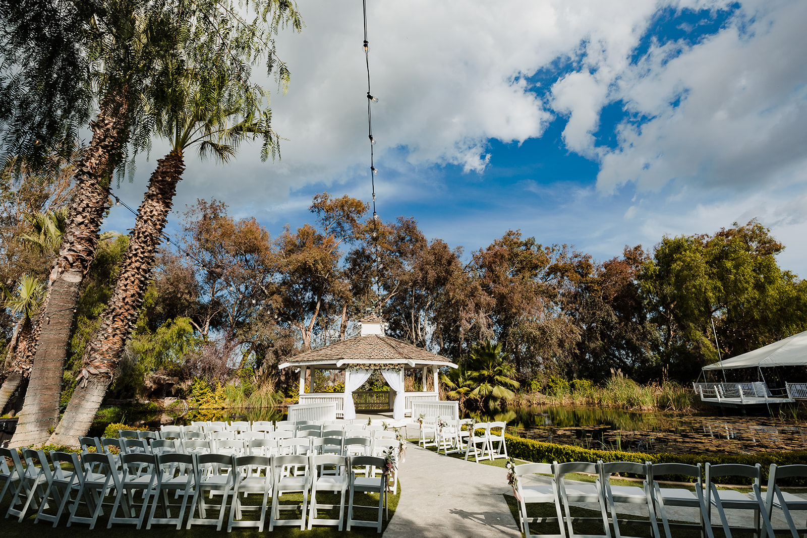 Ceremony area with a gazebo at The Orchard by Wedgewood weddings in Menifee, CA