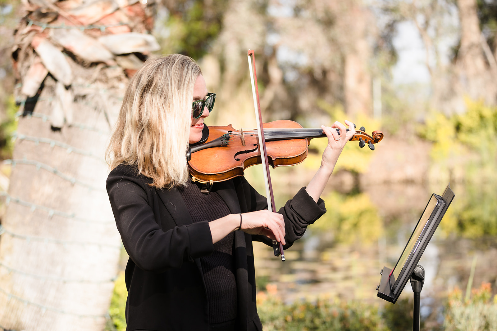 Jessica Haddy of Haddy Music plays the violin during a wedding ceremony in Menifee, CA