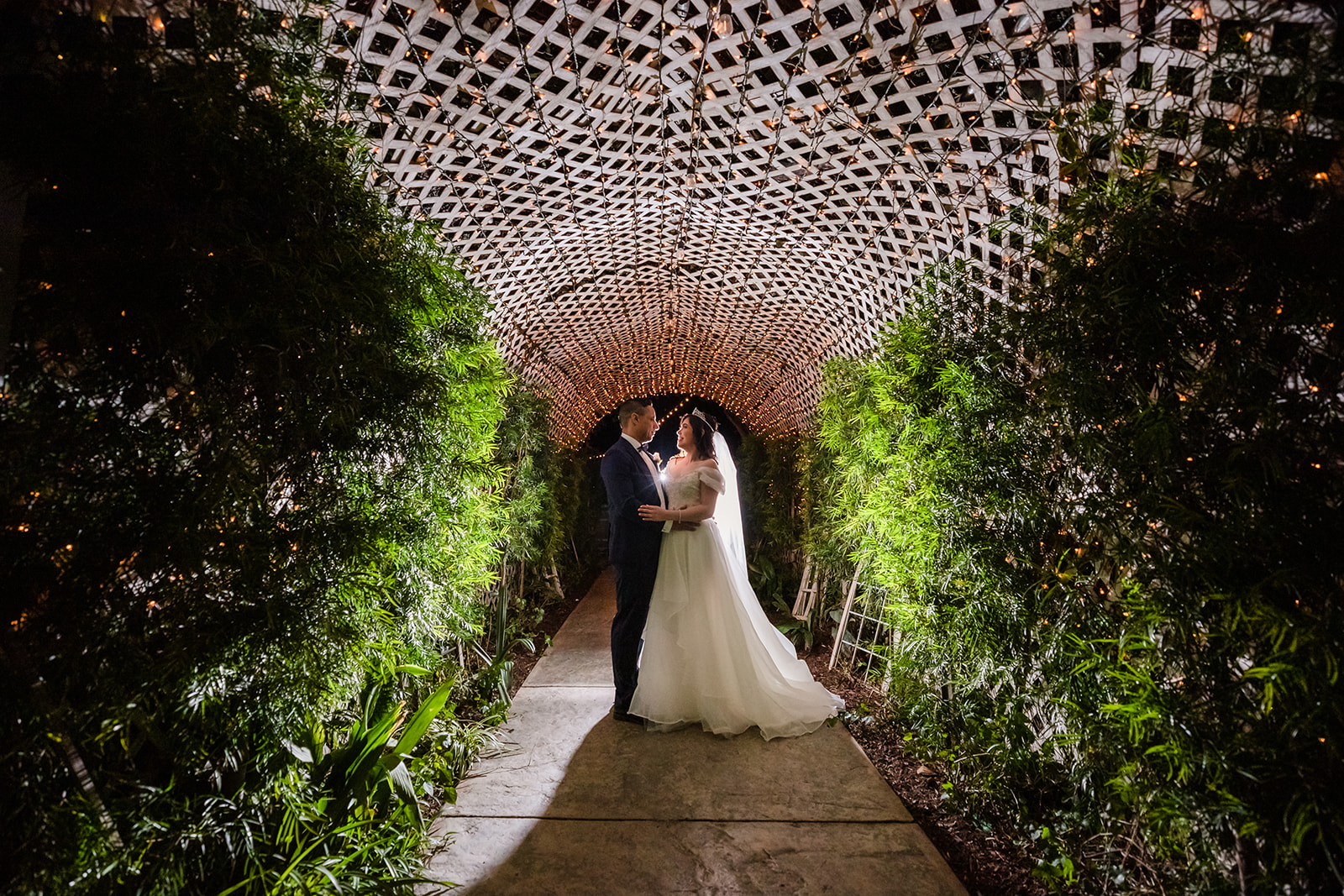 Wedding photos in the tunnel at The Orchard by Wedgewood Weddings in Menifee, CA