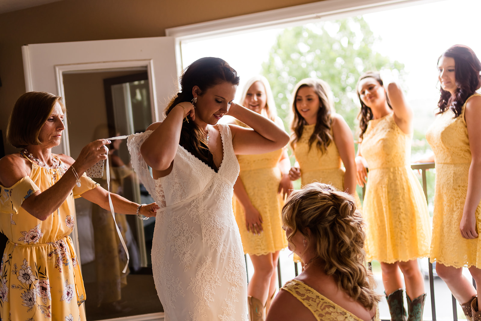 the bride gets ready with her squad for her gorgeous backyard wedding in Colorado
