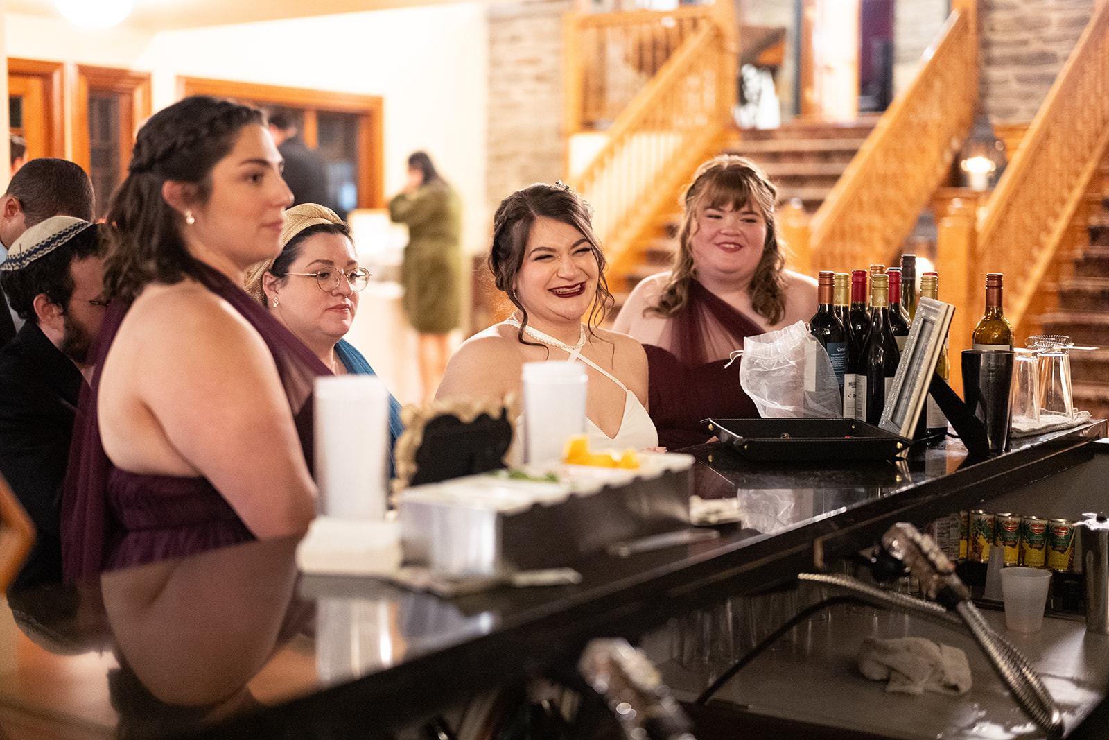 bridesmaids at bar at historic Knowlton Mansion