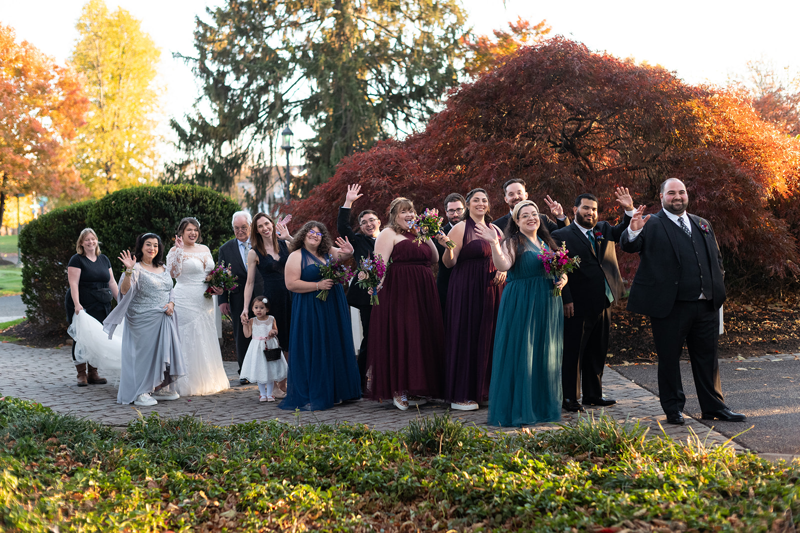 wedding party lined up before outdoor ceremony at Knowlton Mansion 
