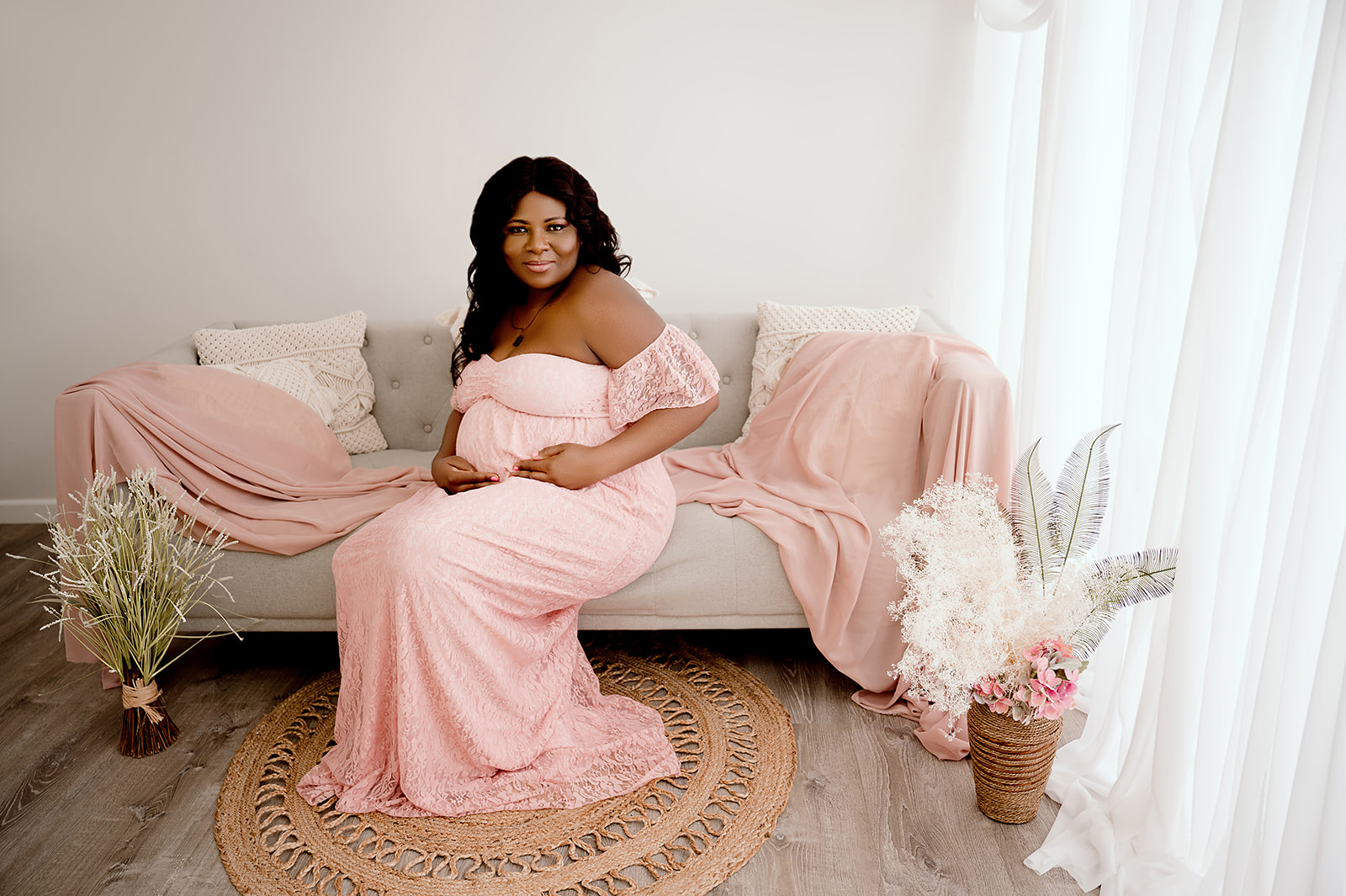 Central Minnesota maternity photographer with a studio and a client closet full of maternity gowns.