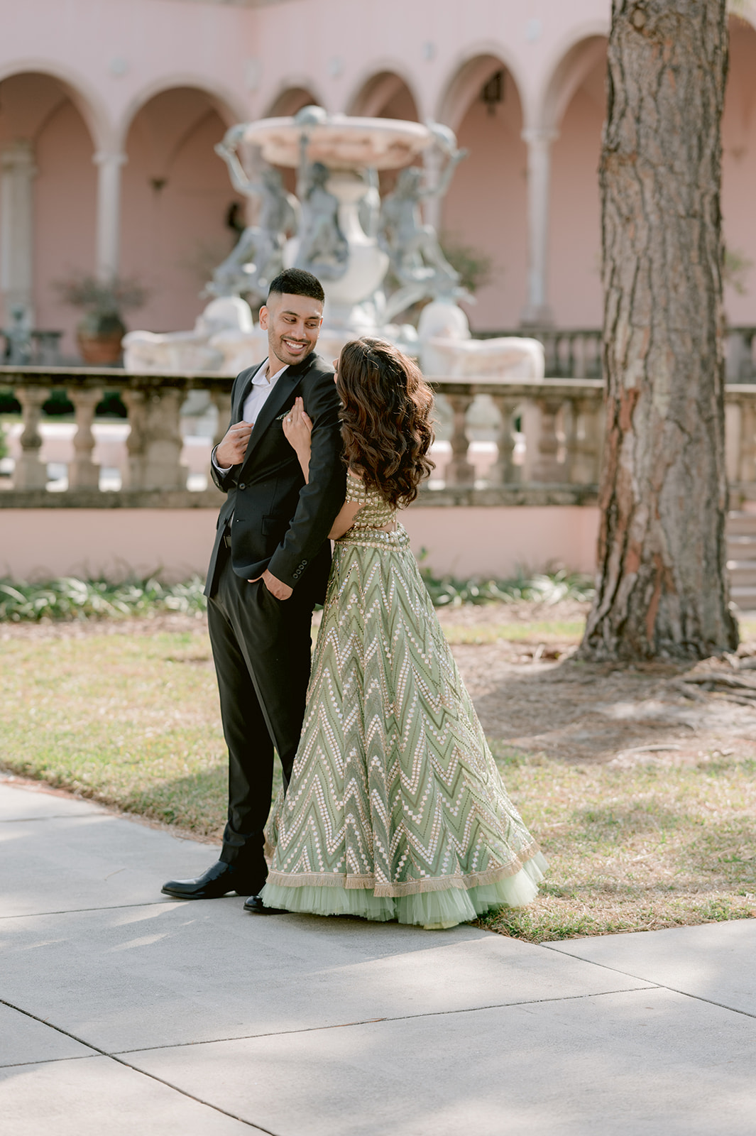 "Beautiful Indian couple captured in front of the Ca' d'Zan mansion at the Ringling Museum"
