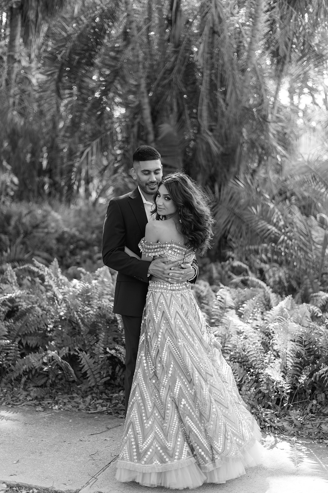 "Elegant engagement session at the John and Mable Ringling Museum features stunning Indian couple"
