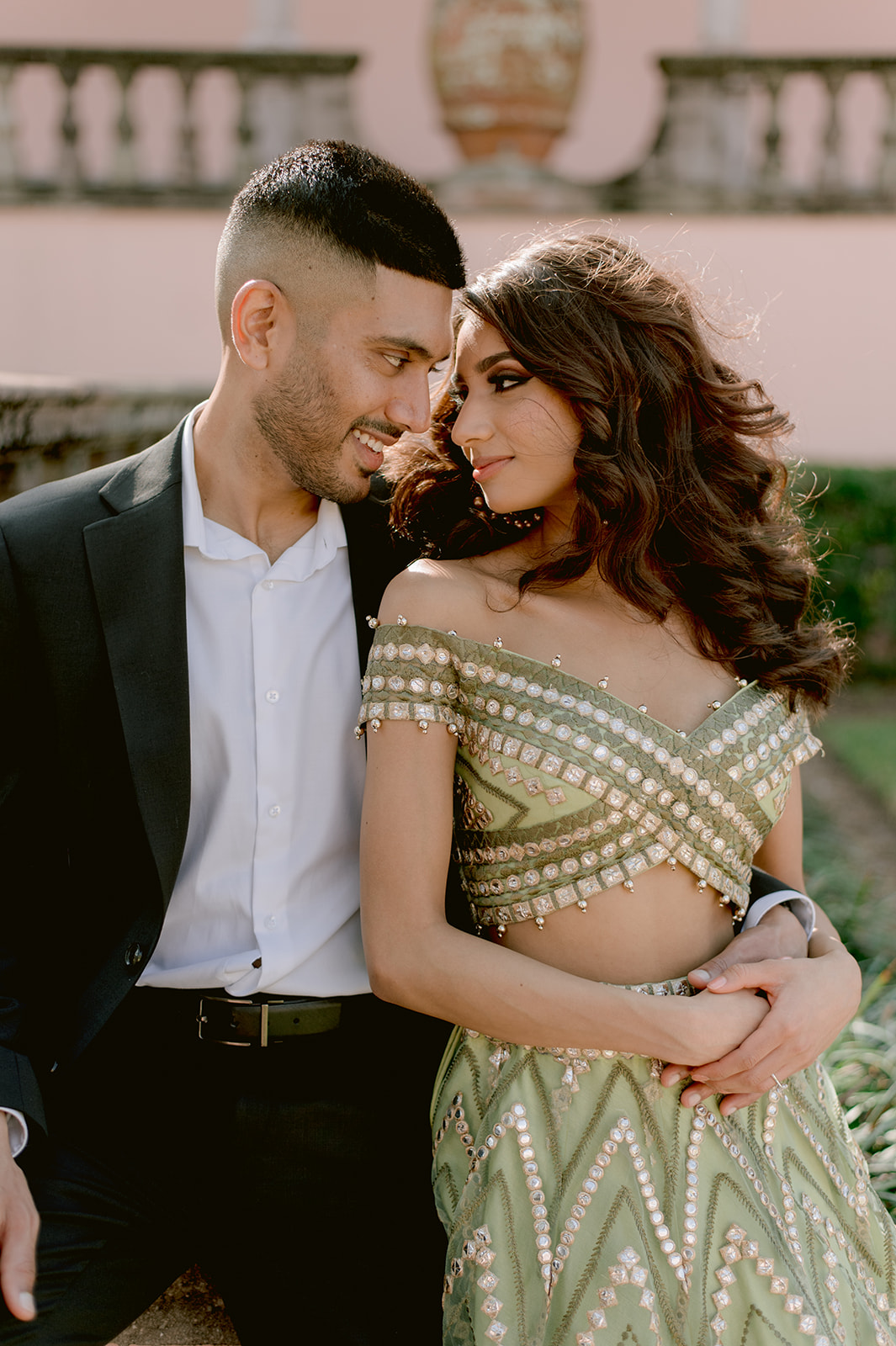 "Elegant and romantic engagement session captured at the Ringling Museum with stunning Indian attire"
