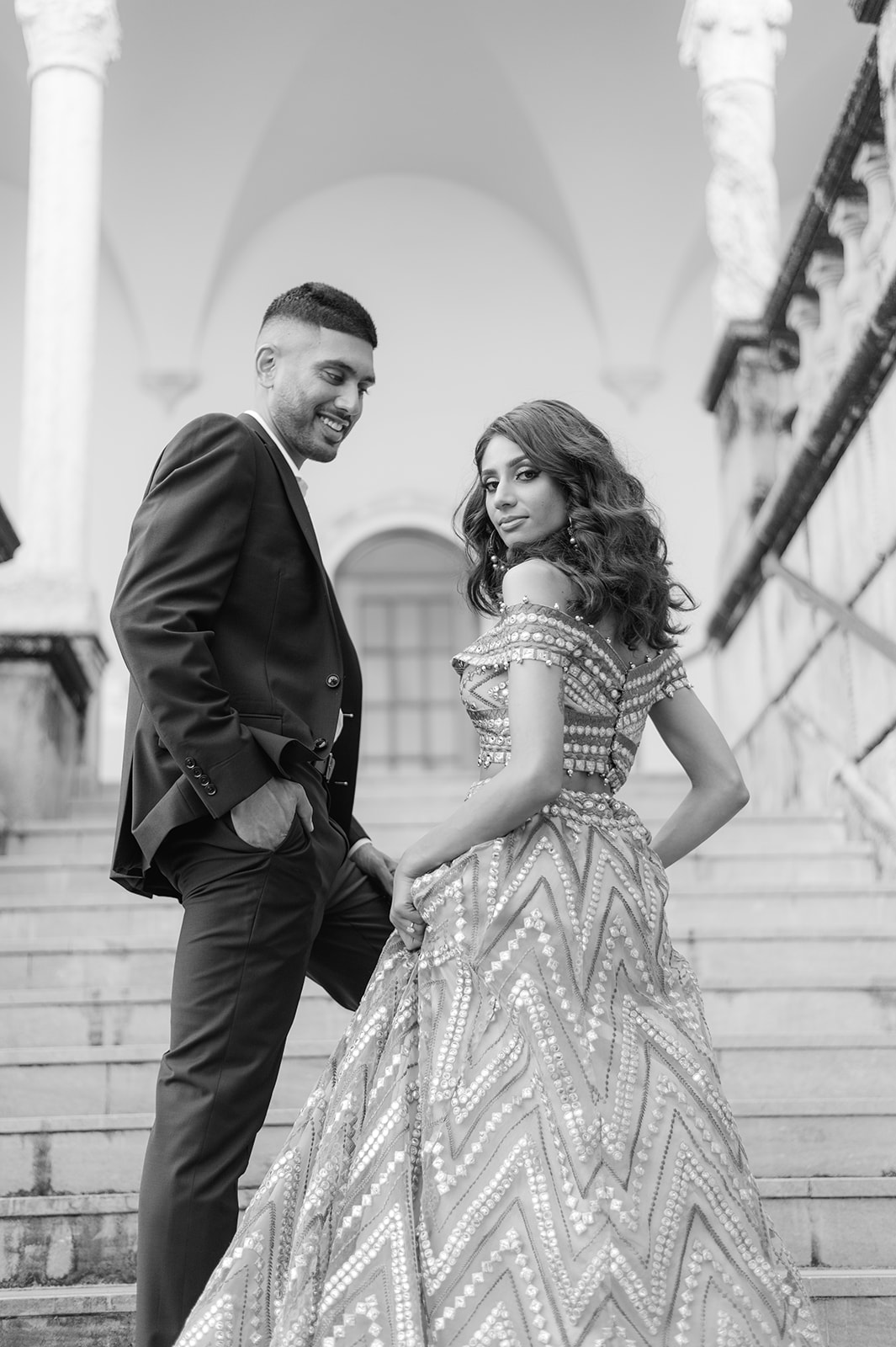 "Indian bride and groom embrace in front of the Ringling Museum's Ca' d'Zan"
