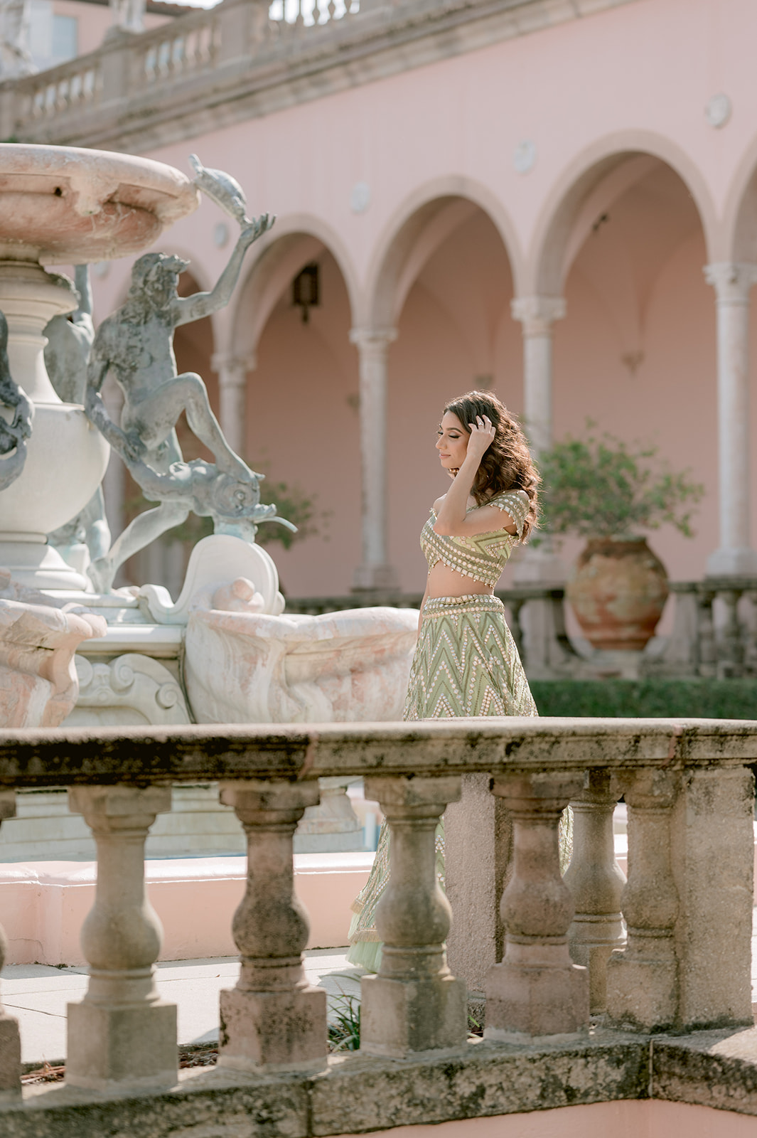 "Indian bride and groom showcasing their love at the Ringling Museum's Ca' d'Zan mansion"
