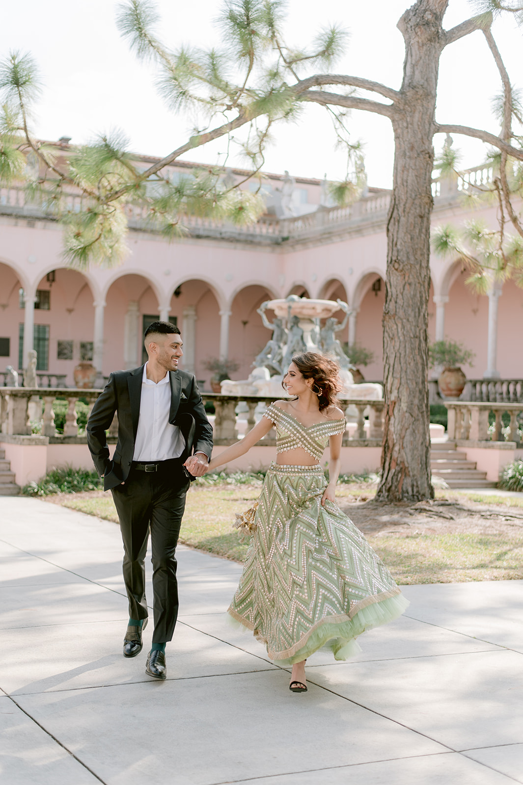 "Indian engagement session with the picturesque Ca' d'Zan mansion at the Ringling Museum"
