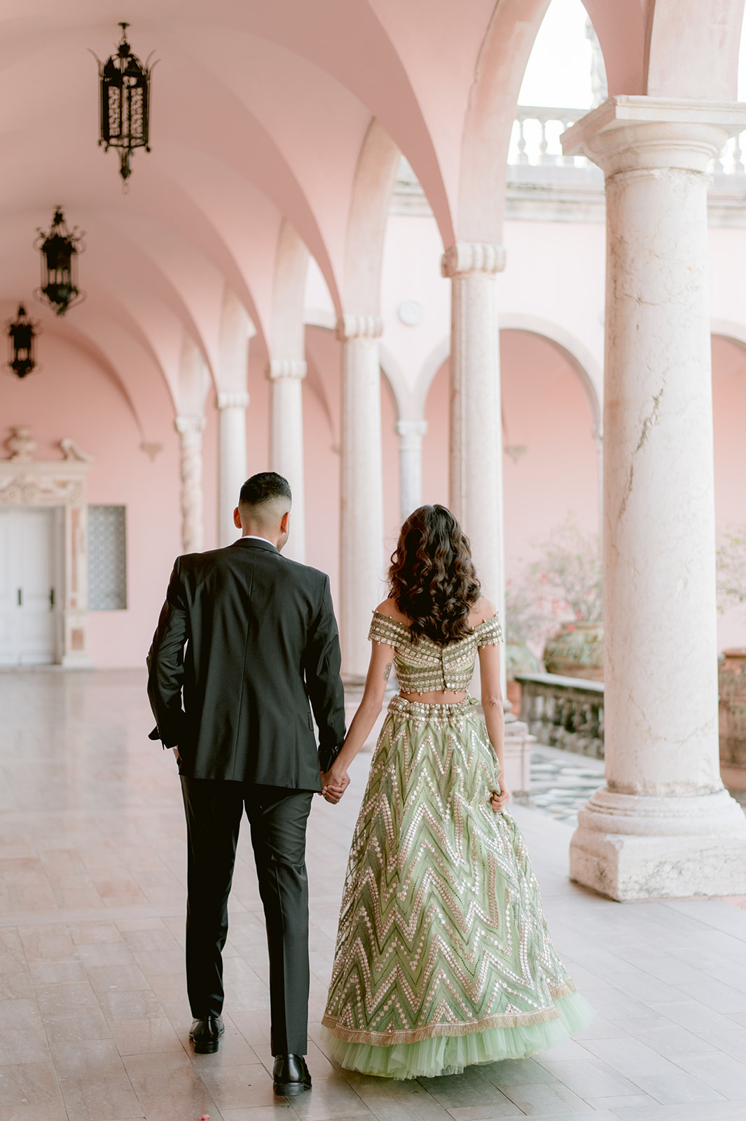 "Ringling Museum engagement session with stunning pastel green and gold Indian attire"
