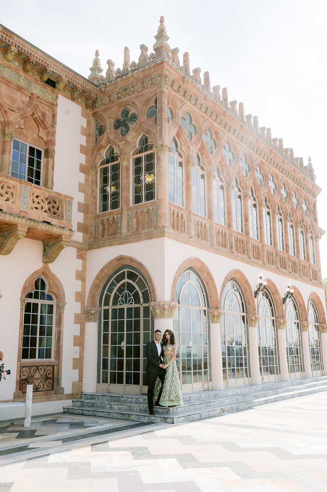 "Ringling Museum engagement shoot captures the beauty of Indian attire and stunning architecture"
