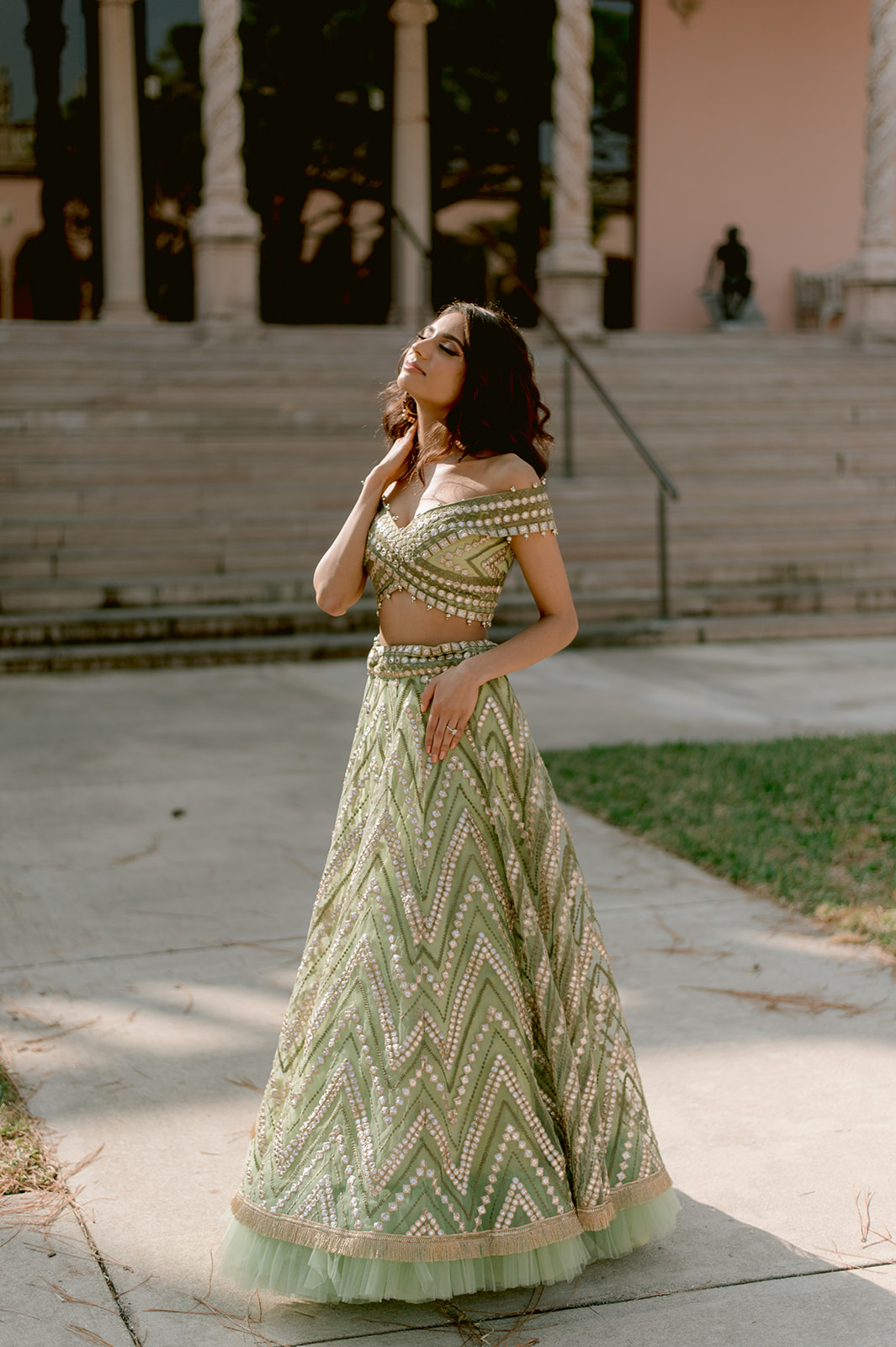 "Ringling Museum engagement shoot featuring pastel green and gold Indian outfit"
