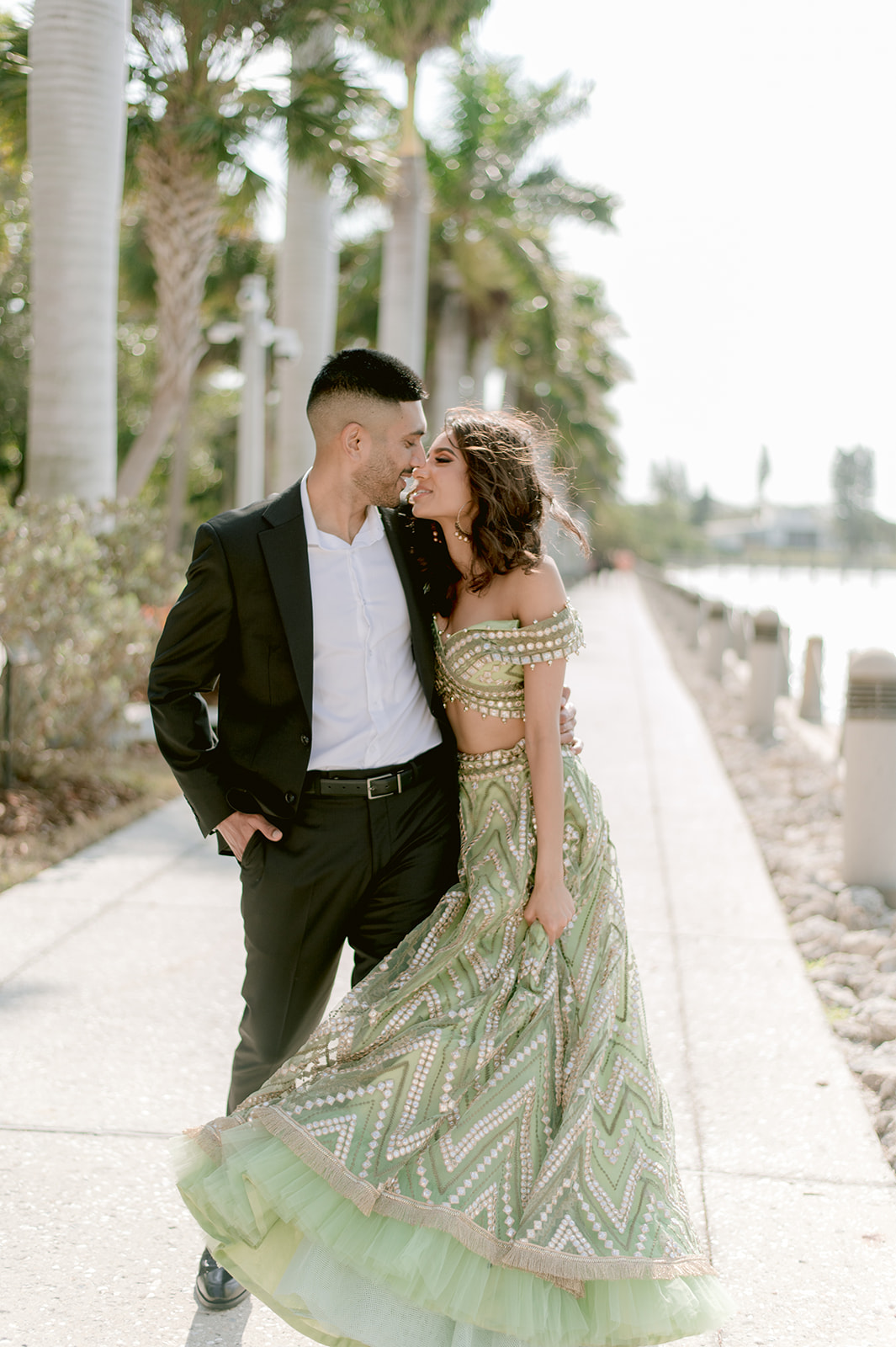 "Ringling Museum engagement shoot with Indian couple captures the beauty of the Ca' d'Zan mansion and love"
