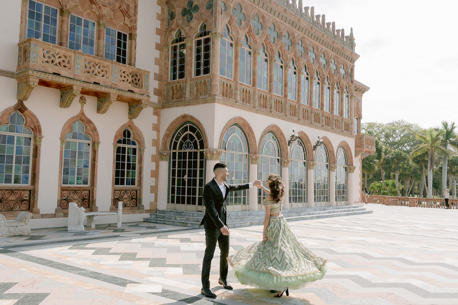 "Ringling Museum engagement shoot with Indian couple captures the beauty of the Ca' d'Zan mansion"
