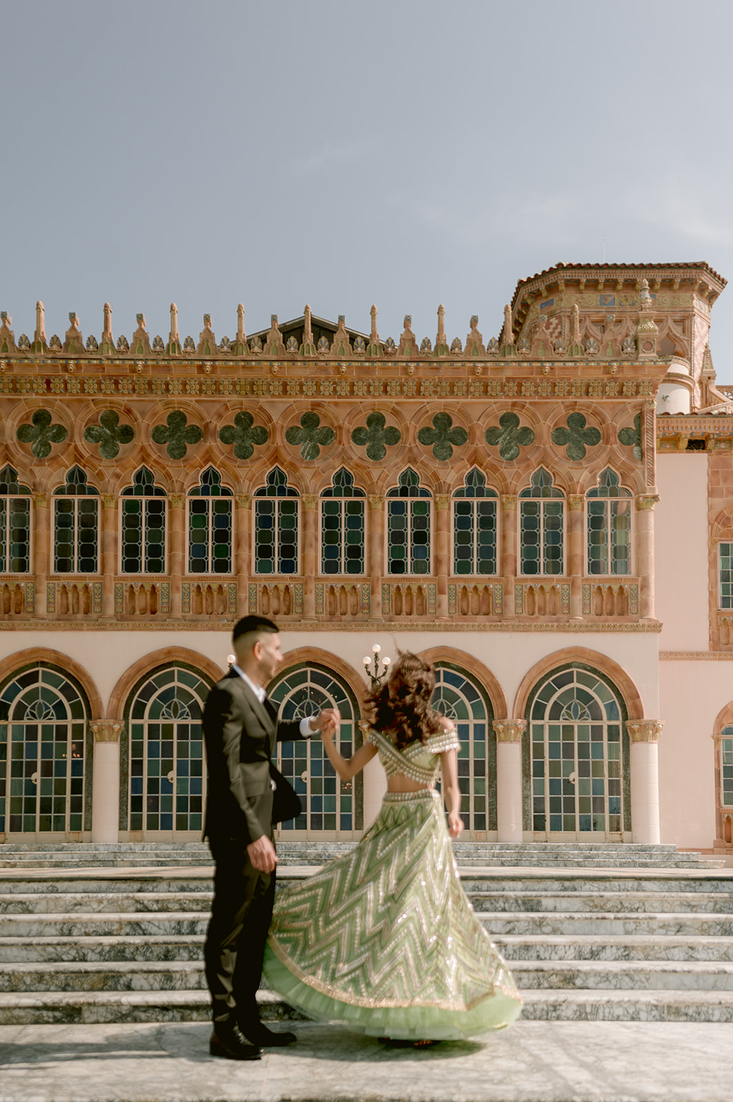 "Romantic engagement session at the John and Mable Ringling Museum features stunning Indian couple and breathtaking loca